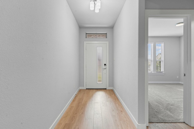 10650 Barrington Ln, Fort Worth, TX 76126 - entryway featuring light wood-type flooring and baseboards