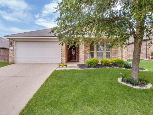 1071 Shepard Ln, Lavon, TX 75166 - view of front of property featuring concrete driveway, a front lawn, a garage, and brick siding