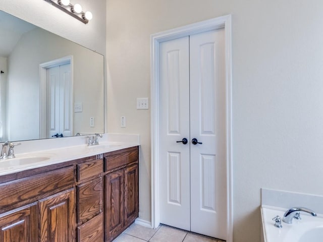 1071 Shepard Ln, Lavon, TX 75166 - full bath featuring double vanity, a garden tub, and tile patterned flooring
