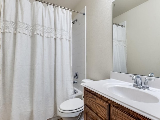 1071 Shepard Ln, Lavon, TX 75166 - full bath with toilet, vanity, shower / tub combo with curtain, and a textured wall