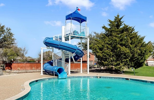 1071 Shepard Ln, Lavon, TX 75166 - community pool featuring a water slide