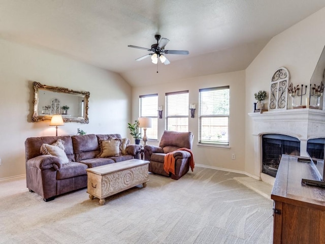 1071 Shepard Ln, Lavon, TX 75166 - living room featuring ceiling fan, light colored carpet, lofted ceiling, baseboards, and a fireplace