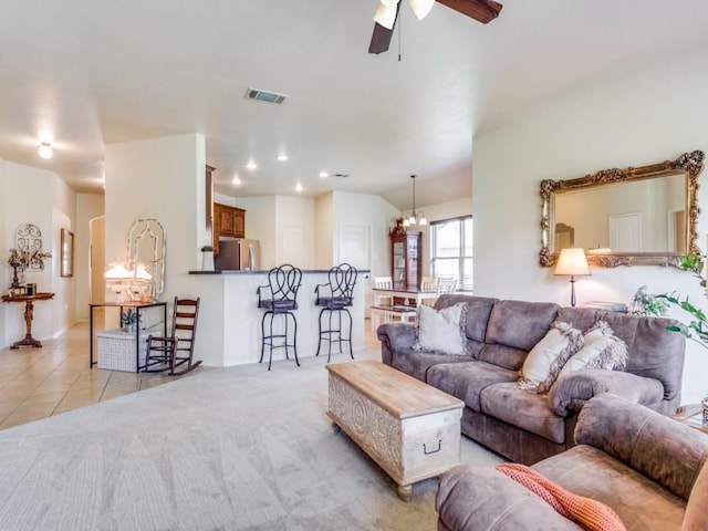 1071 Shepard Ln, Lavon, TX 75166 - living area featuring ceiling fan, a chandelier, light tile patterned floors, and light carpet