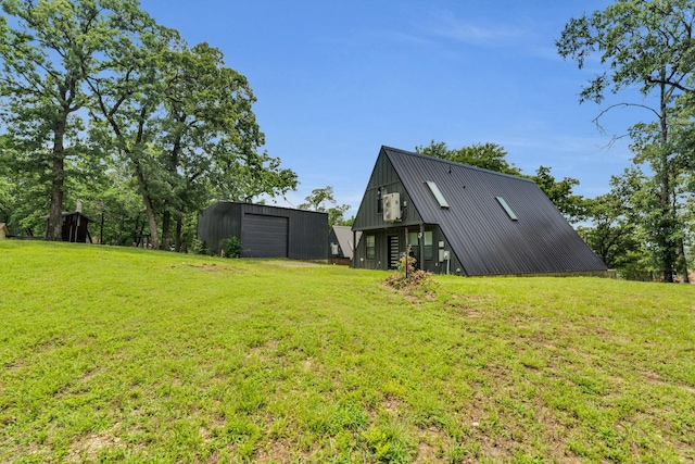 1223 Whispering Springs Dr, Tool, TX 75143 - view of green lawn featuring an outdoor structure, an outbuilding, and a detached garage