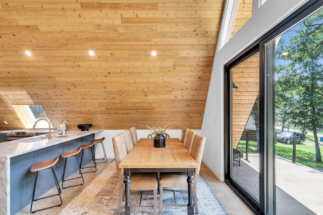 1223 Whispering Springs Dr, Tool, TX 75143 - dining space featuring plenty of natural light, wooden walls, a skylight, and wooden ceiling