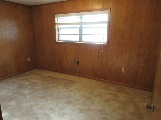 611 W 4th St, Homer, LA 71040 - carpeted spare room with wooden walls and baseboards