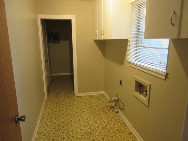611 W 4th St, Homer, LA 71040 - laundry room featuring cabinet space, electric dryer hookup, hookup for a washing machine, light floors, and plenty of natural light