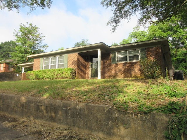 611 W 4th St, Homer, LA 71040 - single story home with brick siding