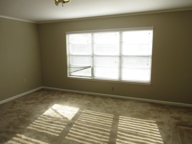 611 W 4th St, Homer, LA 71040 - carpeted empty room featuring baseboards and ornamental molding