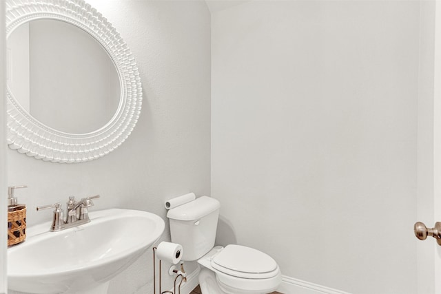 3912 River Bend St, Mckinney, TX 75071 - bathroom with a sink, toilet, and baseboards