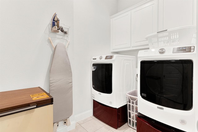 3912 River Bend St, Mckinney, TX 75071 - washroom featuring cabinet space, washer and clothes dryer, light tile patterned flooring, and baseboards