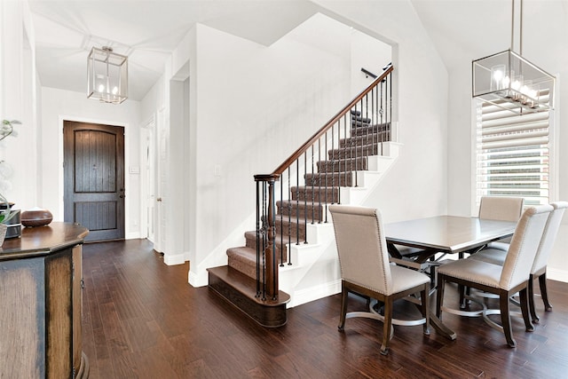 3912 River Bend St, Mckinney, TX 75071 - dining area featuring a chandelier, stairs, dark wood finished floors, and baseboards