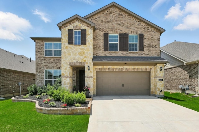 2621 Atticus Way, Northlake, TX 76247 - traditional-style home with a garage, concrete driveway, stone siding, a front yard, and brick siding