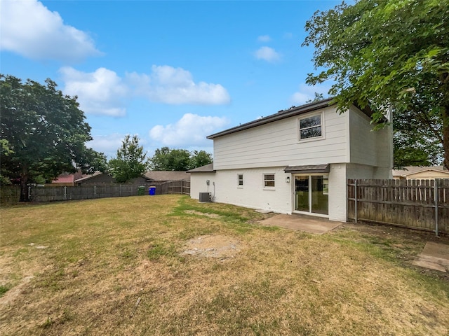7620 Clover Ln, Watauga, TX 76148 - back of house featuring brick siding and cooling unit