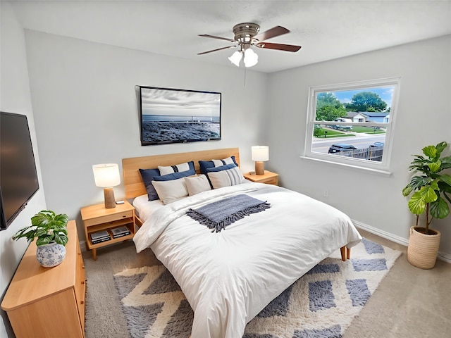 7620 Clover Ln, Watauga, TX 76148 - carpeted bedroom featuring baseboards and ceiling fan