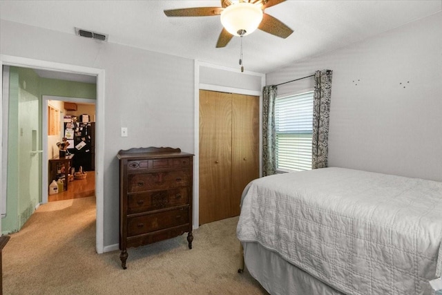2311 Anderson St, Irving, TX 75062 - carpeted bedroom featuring a closet, a ceiling fan, and lofted ceiling
