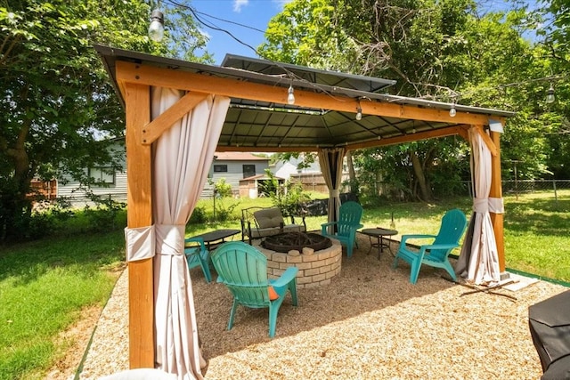 2311 Anderson St, Irving, TX 75062 - view of patio featuring a gazebo and a fire pit