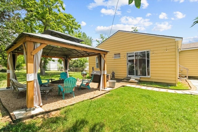 2311 Anderson St, Irving, TX 75062 - back of house featuring a gazebo, entry steps, and a fire pit