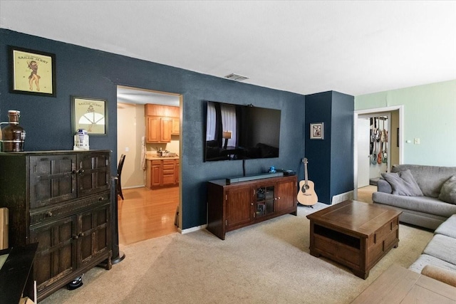2311 Anderson St, Irving, TX 75062 - living room featuring light carpet