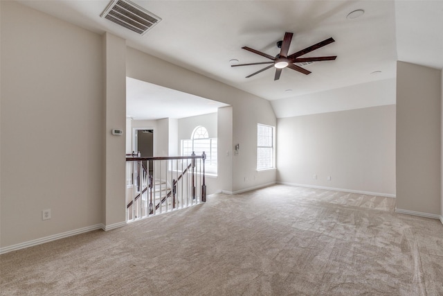 4037 Azure Ln, Addison, TX 75001 - empty room featuring ceiling fan, carpet floors, lofted ceiling, and baseboards