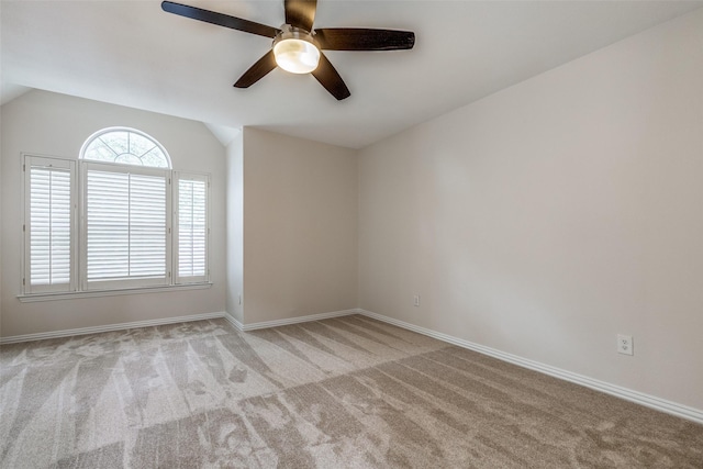 4037 Azure Ln, Addison, TX 75001 - carpeted spare room featuring a ceiling fan, baseboards, and vaulted ceiling