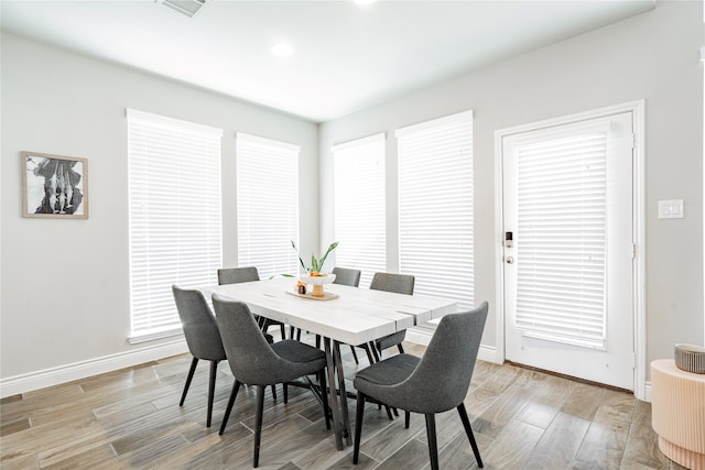 1507 Calcot Ln, Forney, TX 75126 - dining space featuring baseboards, light wood-style floors, and recessed lighting