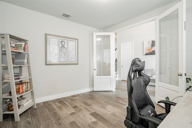 1507 Calcot Ln, Forney, TX 75126 - home office with wood finished floors, french doors, and baseboards