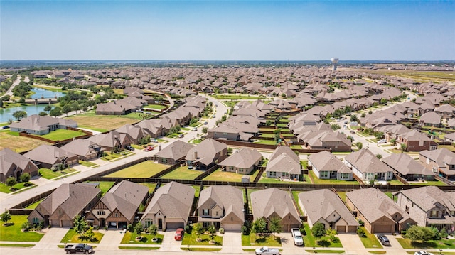 1507 Calcot Ln, Forney, TX 75126 - aerial perspective of suburban area with a nearby body of water