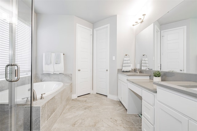 1507 Calcot Ln, Forney, TX 75126 - full bath with double vanity, a bath, and a shower stall
