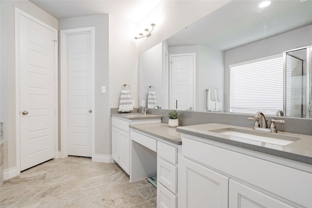 1507 Calcot Ln, Forney, TX 75126 - full bath featuring double vanity, a shower, and baseboards