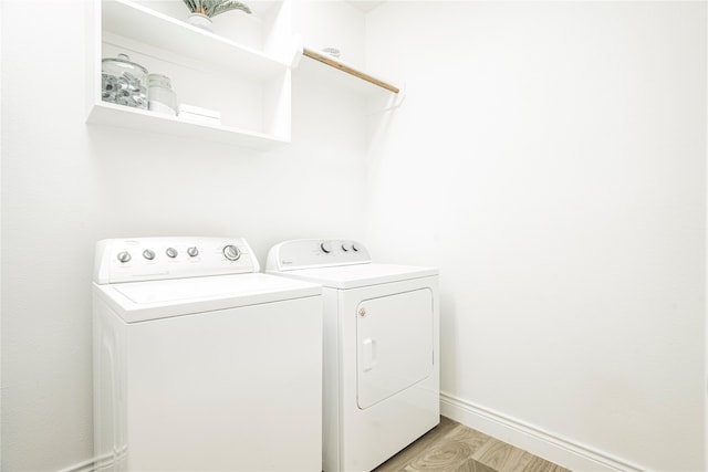 1507 Calcot Ln, Forney, TX 75126 - washroom featuring washer and dryer, light wood-style floors, and baseboards