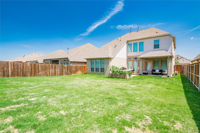 1507 Calcot Ln, Forney, TX 75126 - back of property featuring an outdoor living space, a patio, brick siding, and roof with shingles
