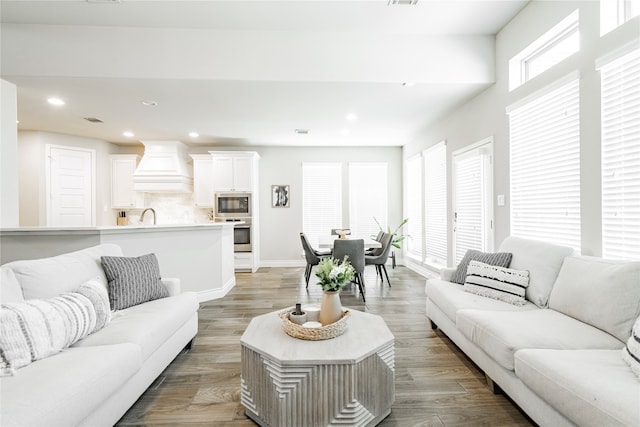 1507 Calcot Ln, Forney, TX 75126 - living area with baseboards, recessed lighting, and light wood-style flooring