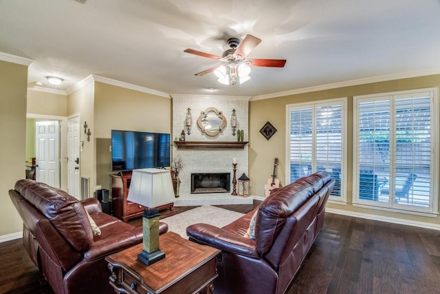 3904 Walden Way, Dallas, TX 75287 - living area featuring ceiling fan, dark wood finished floors, a brick fireplace, crown molding, and baseboards