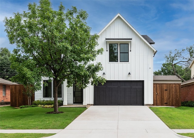 10321 Lakemere Dr, Dallas, TX 75238 - modern farmhouse style home with board and batten siding, an attached garage, and concrete driveway