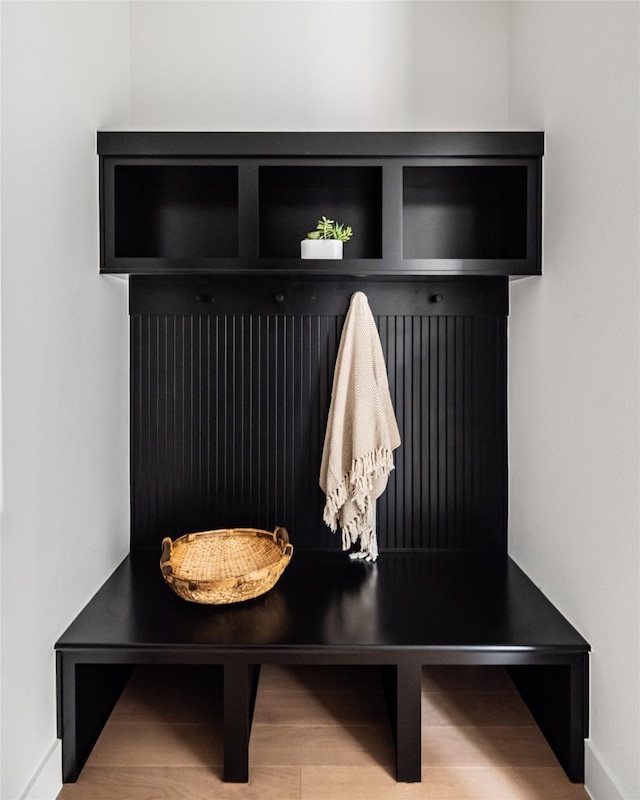 10321 Lakemere Dr, Dallas, TX 75238 - mudroom with baseboards and wood finished floors