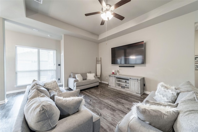 293 Cisco Trl, Forney, TX 75126 - living room featuring baseboards, ceiling fan, a raised ceiling, and dark wood-type flooring