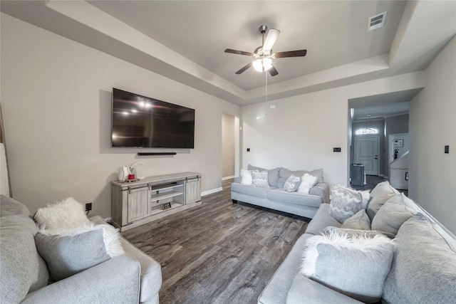 293 Cisco Trl, Forney, TX 75126 - living room with a tray ceiling, a ceiling fan, dark wood-style flooring, and baseboards