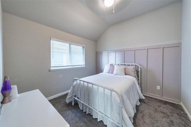 293 Cisco Trl, Forney, TX 75126 - bedroom with dark colored carpet, vaulted ceiling, a decorative wall, a ceiling fan, and a wainscoted wall