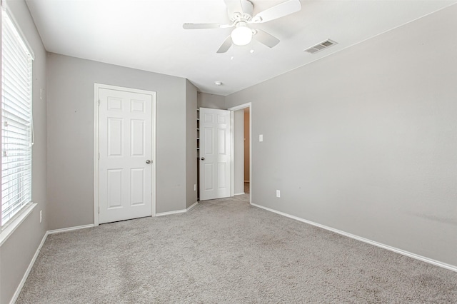 1253 Stone Ln, Celina, TX 75009 - unfurnished bedroom featuring light colored carpet, baseboards, and a ceiling fan