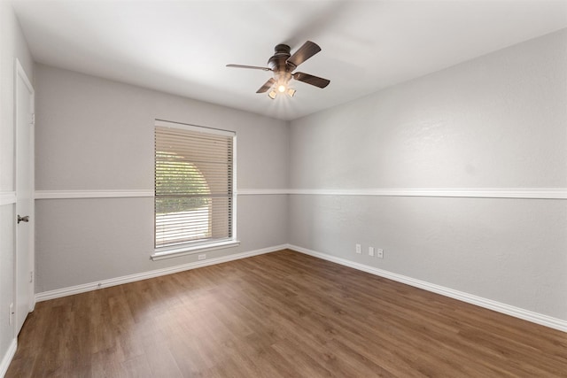 7624 Lake Highlands Dr, Fort Worth, TX 76179 - spare room with wood finished floors, a ceiling fan, and baseboards