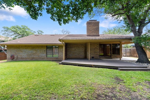 7624 Lake Highlands Dr, Fort Worth, TX 76179 - rear view of house featuring a chimney, brick siding, a wooden deck, and a tile roof