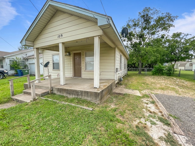 109 S 5th St, Sanger, TX 76266 - shotgun-style home featuring covered porch