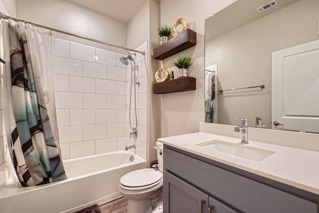1225 Elmwood Dr, Cedar Hill, TX 75104 - full bath with shower / bath combo with shower curtain, vanity, toilet, a textured wall, and wood finished floors