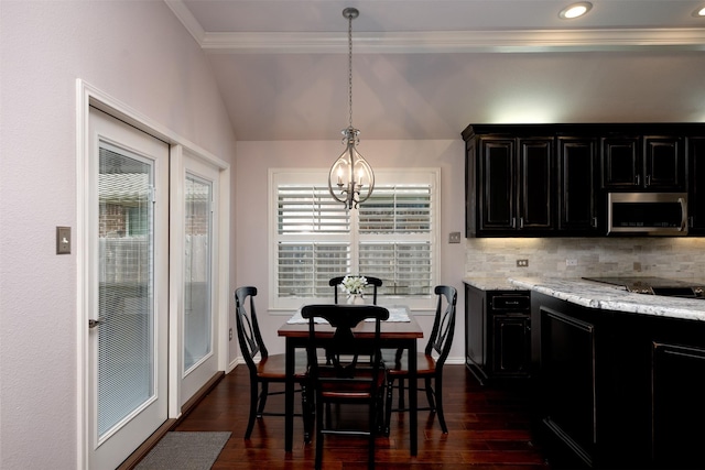 5141 Pinellas Ave, Fort Worth, TX 76244 - dining space with a chandelier, ornamental molding, dark wood-style floors, vaulted ceiling, and recessed lighting