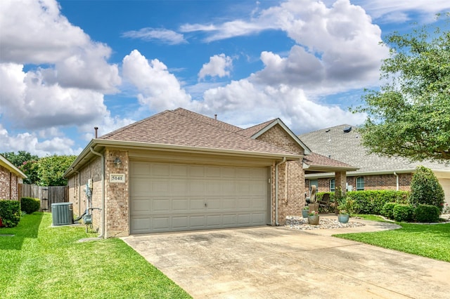 5141 Pinellas Ave, Fort Worth, TX 76244 - single story home featuring brick siding, a garage, driveway, roof with shingles, and central AC unit