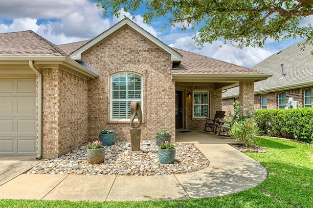 5141 Pinellas Ave, Fort Worth, TX 76244 - view of front facade featuring brick siding, roof with shingles, and a front lawn