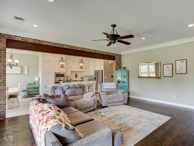 1029 Spanish Moss Cir, Bossier City, LA 71111 - living area featuring ceiling fan, dark wood-type flooring, recessed lighting, crown molding, and baseboards