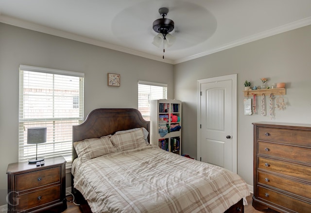 1029 Spanish Moss Cir, Bossier City, LA 71111 - bedroom with crown molding, dark wood-style flooring, and ceiling fan