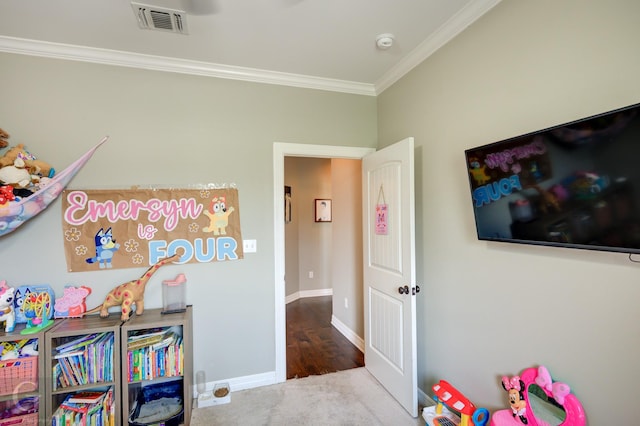1029 Spanish Moss Cir, Bossier City, LA 71111 - rec room featuring crown molding, baseboards, and wood finished floors